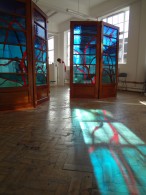 Beauty's Guardians; in afternoon sunlight, 4-door room divider shown at The Kennington GlassSmiths exhibition, London